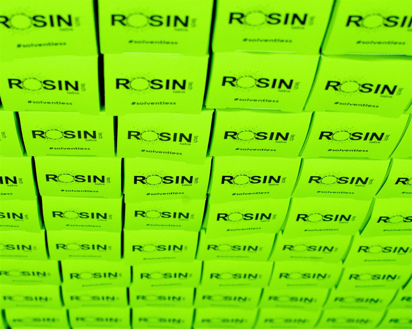 A wall of Rosin Tech Labs green boxes